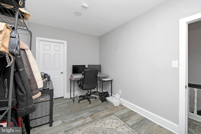 office area with hardwood / wood-style floors