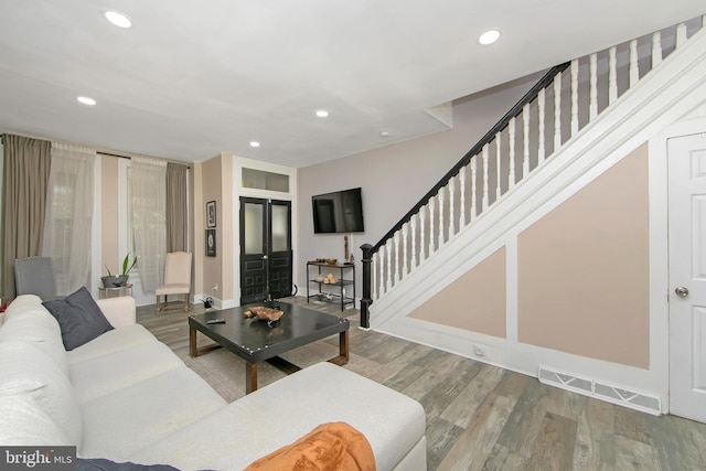 living room with wood-type flooring