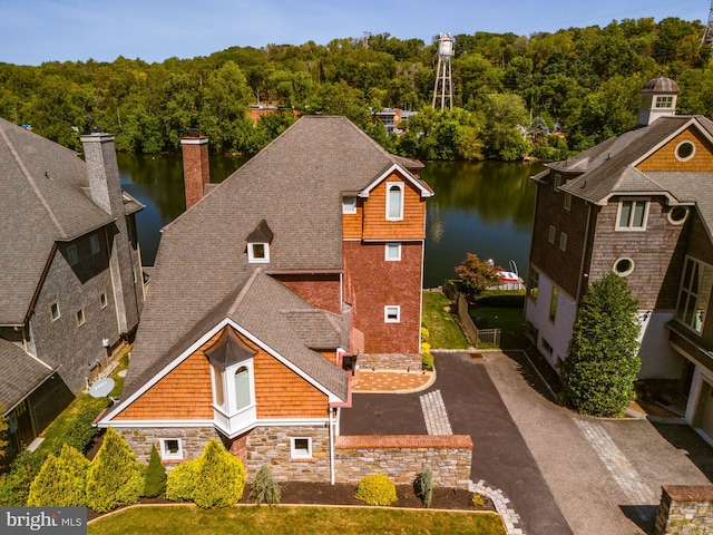 bird's eye view with a water view