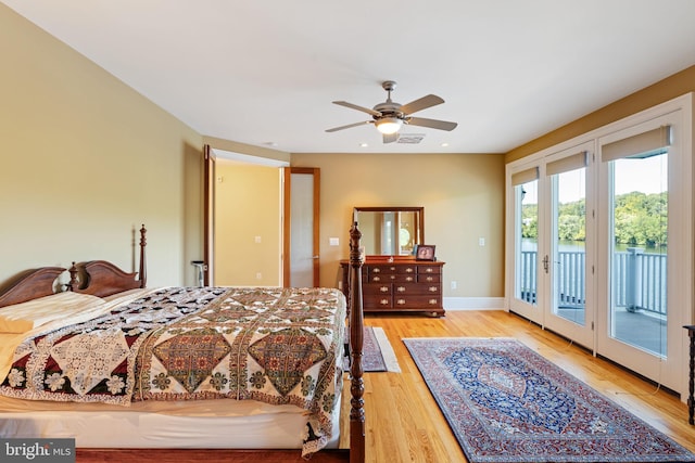 bedroom with access to exterior, ceiling fan, french doors, and light hardwood / wood-style floors