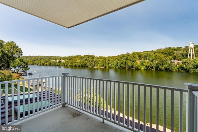 balcony featuring a water view