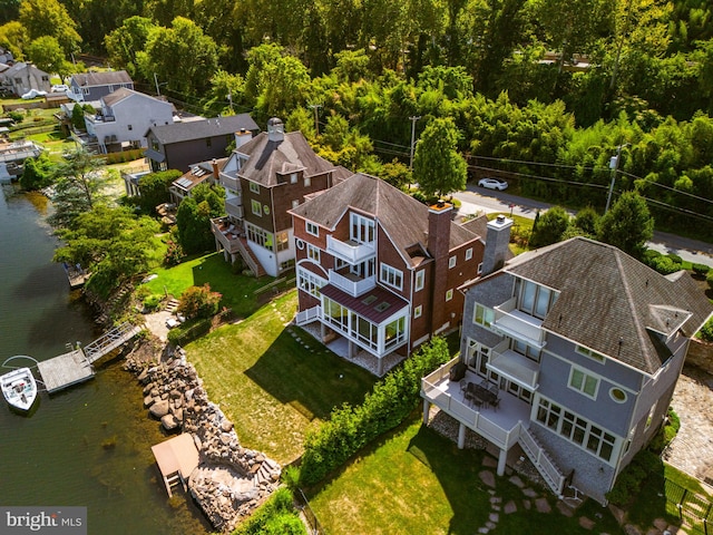 drone / aerial view with a water view