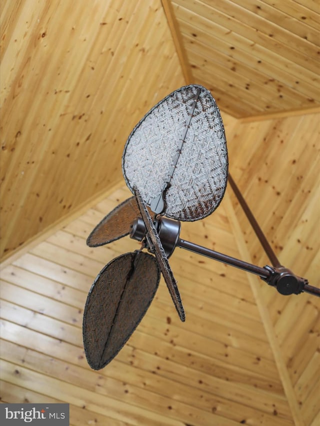 interior details with wood ceiling and wooden walls