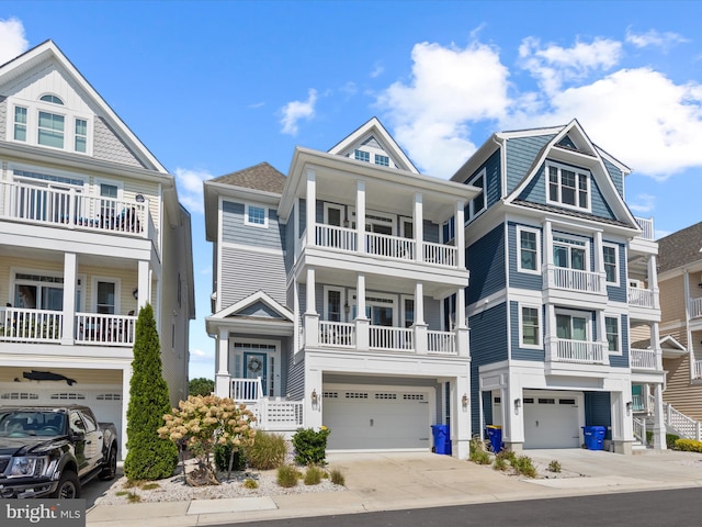 view of front of property with a balcony and a garage