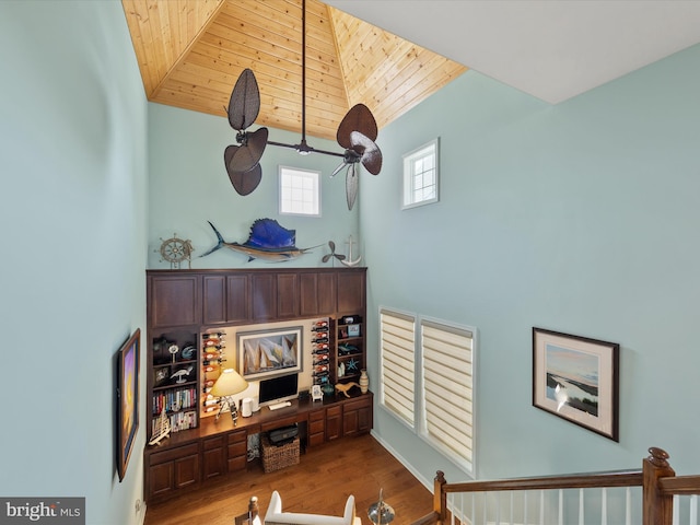 living room featuring hardwood / wood-style flooring and wooden ceiling