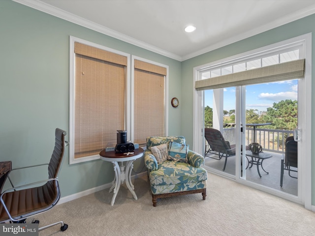 sitting room featuring ornamental molding, french doors, and carpet flooring