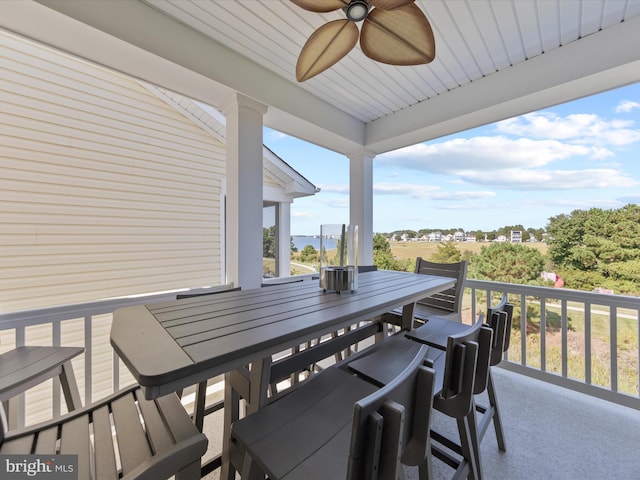 exterior space featuring ceiling fan