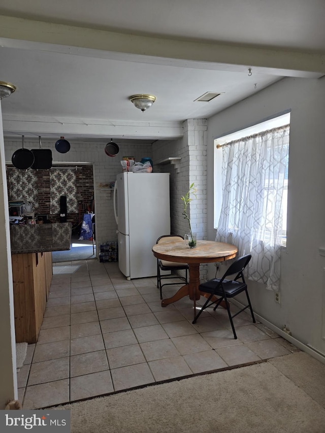 view of tiled dining area