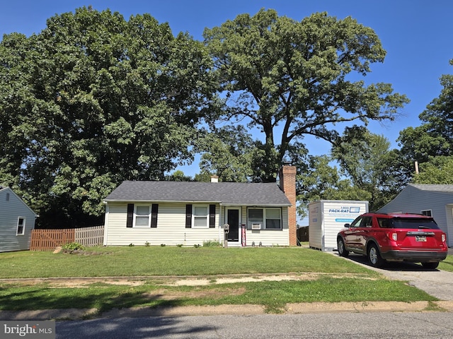 view of front of property with a front lawn