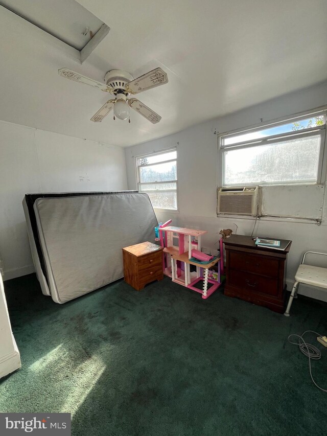 bedroom with dark carpet and ceiling fan