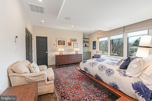 bedroom featuring dark wood-type flooring