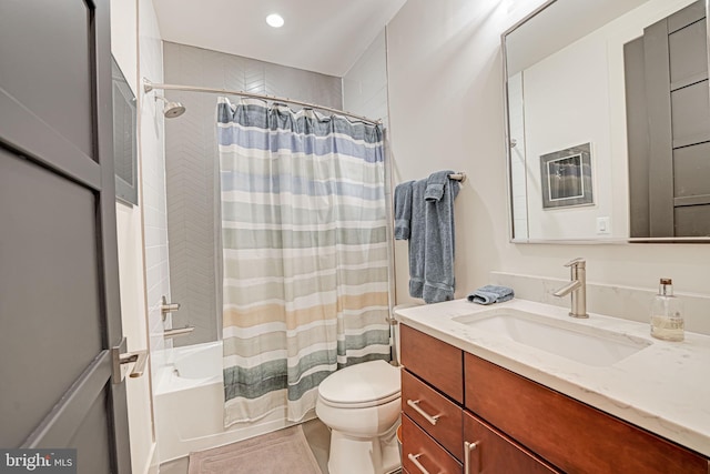 full bathroom with vanity, toilet, recessed lighting, and shower / bath combo