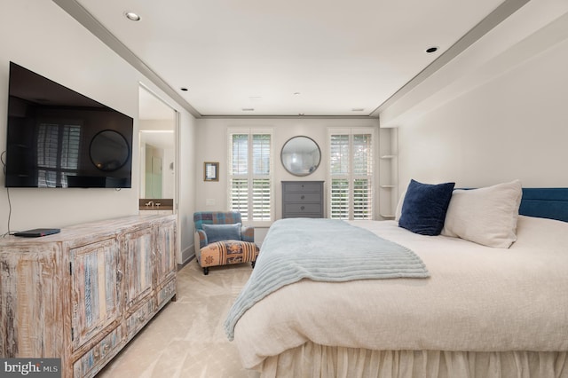 bedroom with light colored carpet