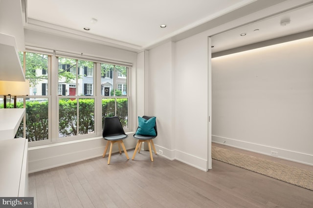 sitting room featuring light hardwood / wood-style floors