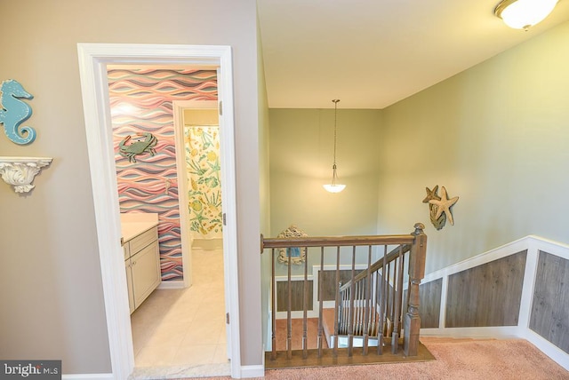 stairway with tile patterned flooring