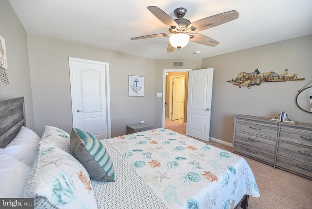 carpeted bedroom with ceiling fan