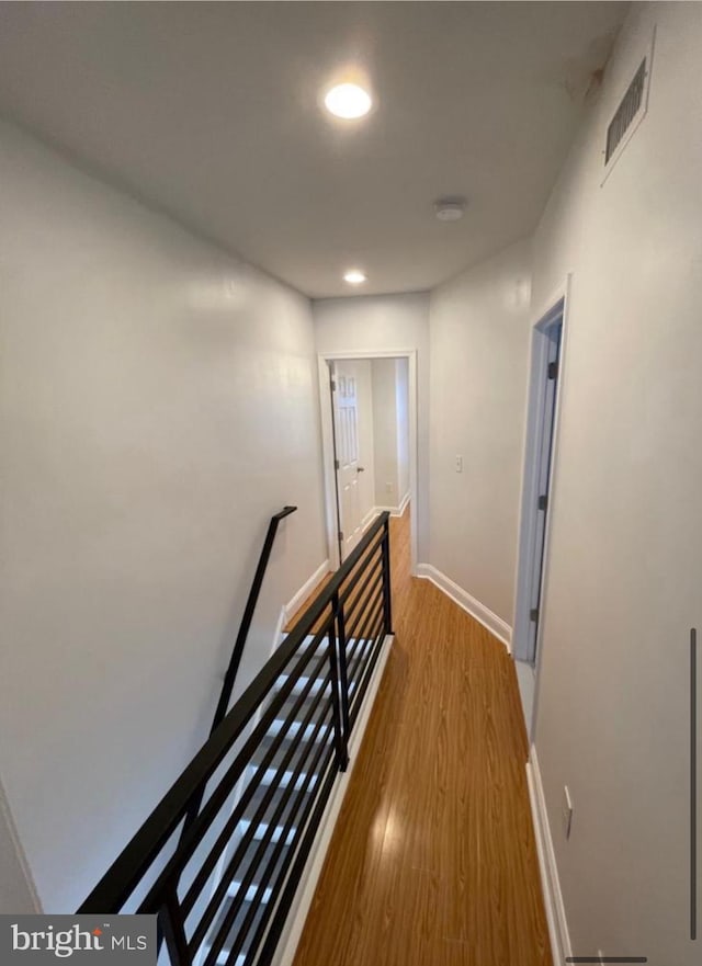 hall featuring hardwood / wood-style floors