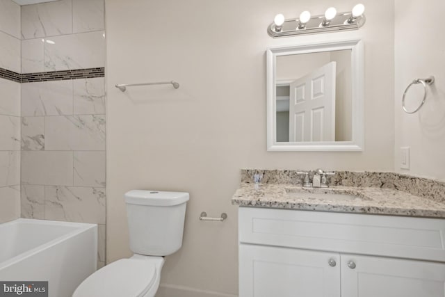 full bathroom with toilet, tiled shower / bath combo, and vanity