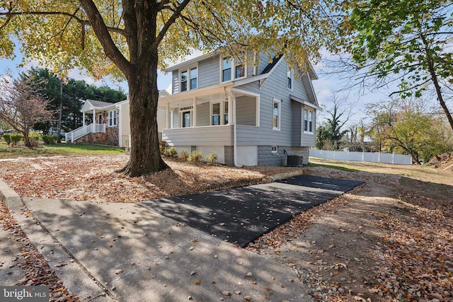 view of front of home with central air condition unit and covered porch