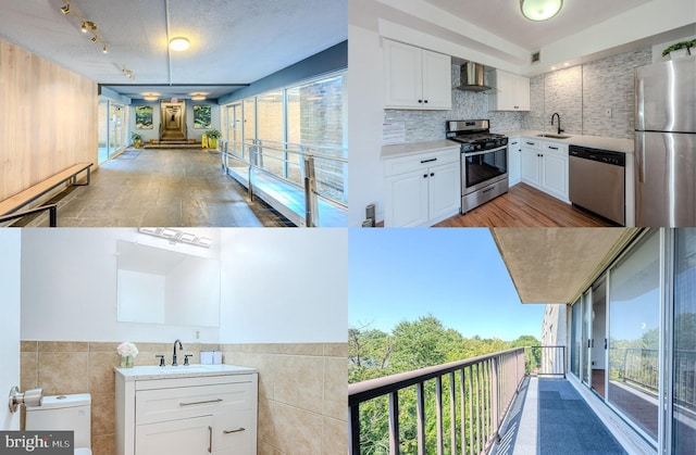 kitchen featuring white cabinets, appliances with stainless steel finishes, sink, wall chimney exhaust hood, and decorative backsplash