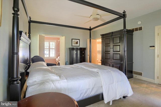 bedroom featuring light colored carpet and ceiling fan