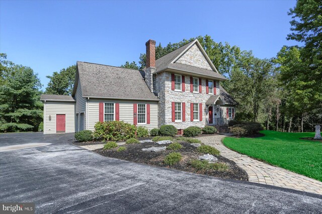 view of front of home with a front yard