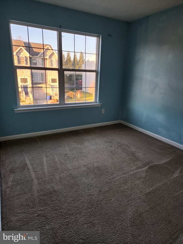 view of carpeted spare room