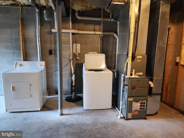 utility room featuring washer and dryer