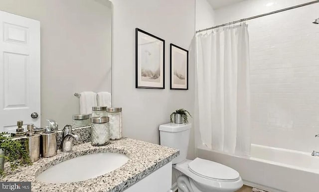 full bathroom with vanity, toilet, and shower / bath combination with curtain