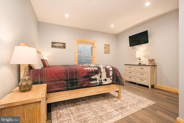 bedroom featuring hardwood / wood-style floors