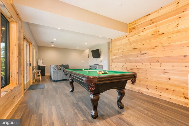 playroom featuring pool table, wooden walls, and hardwood / wood-style flooring