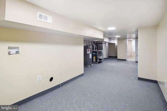 basement featuring electric water heater