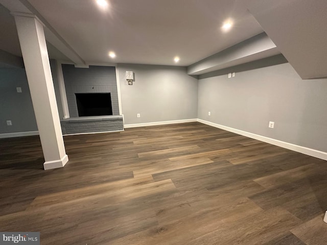 basement featuring dark hardwood / wood-style floors