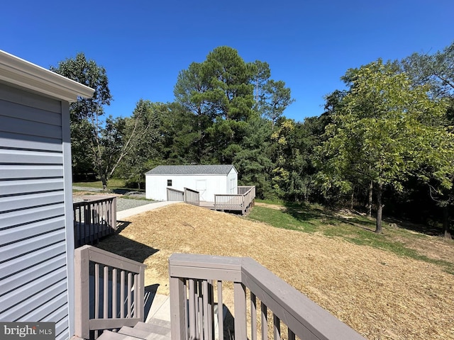 view of yard featuring a wooden deck