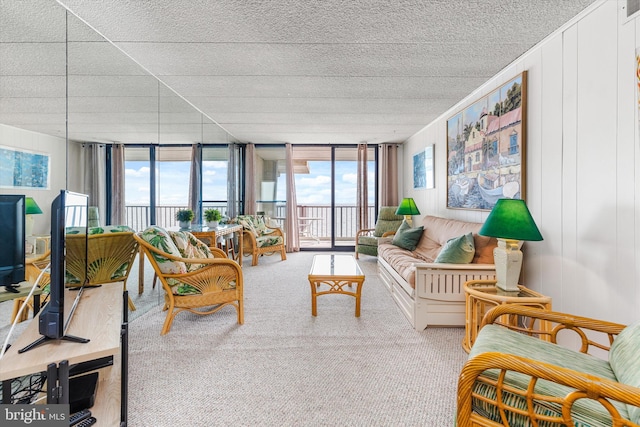 carpeted living room featuring a wealth of natural light