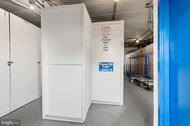 interior space featuring concrete flooring