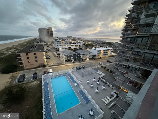 exterior space featuring a view of city and a water view