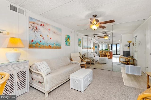 living room with ceiling fan