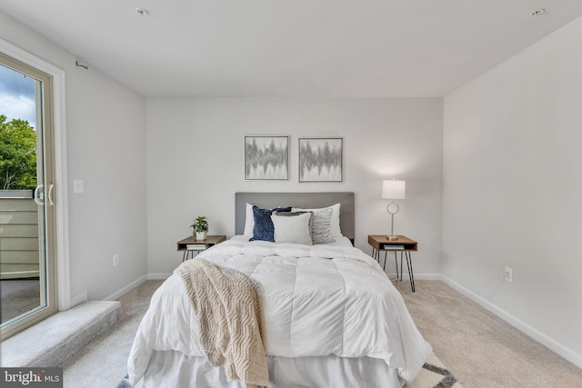 bedroom with light carpet