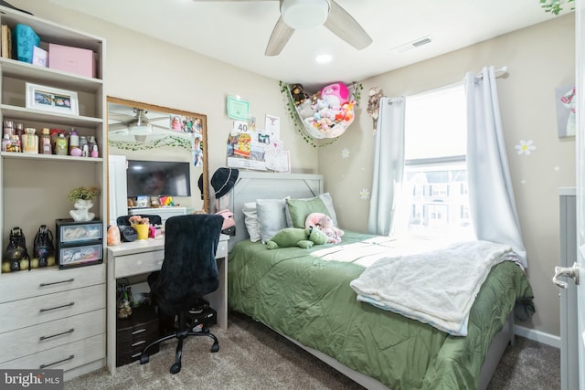 carpeted bedroom featuring ceiling fan