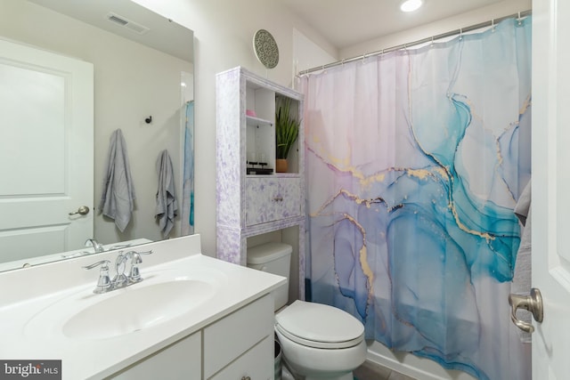 full bathroom featuring toilet, vanity, and shower / tub combo with curtain