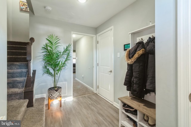 mudroom featuring wood-type flooring