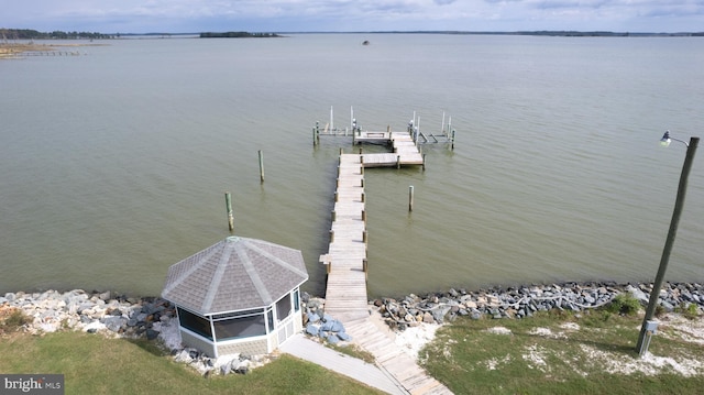 dock area featuring a water view and boat lift