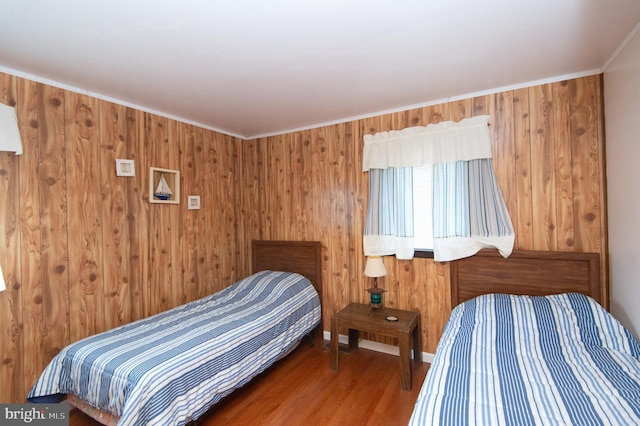 bedroom with wood finished floors