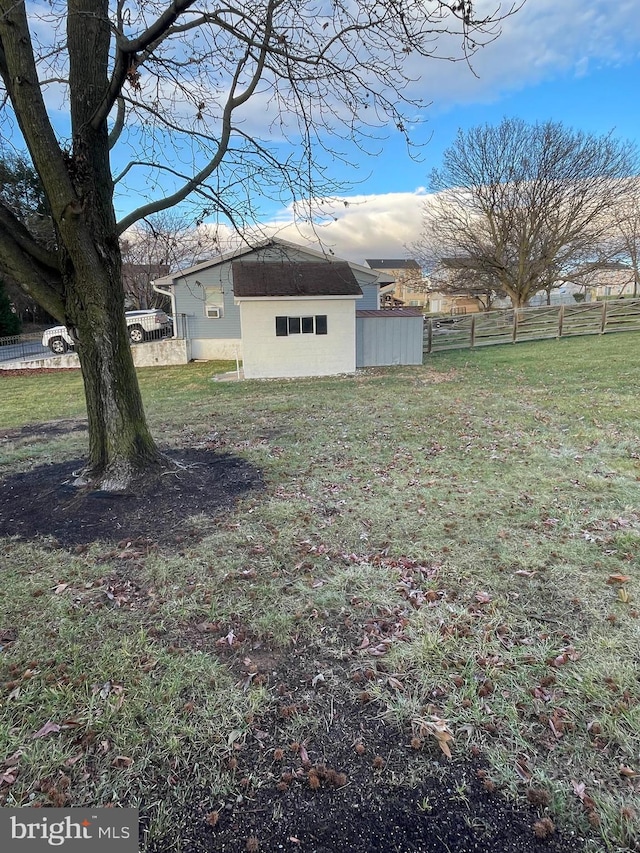 view of yard featuring fence