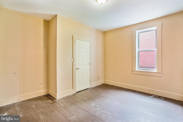 empty room featuring hardwood / wood-style floors