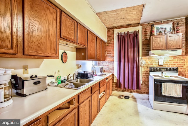 kitchen with sink, brick wall, and electric range