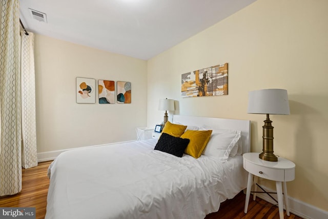 bedroom featuring hardwood / wood-style floors