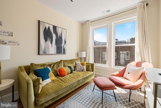 sitting room featuring a fireplace