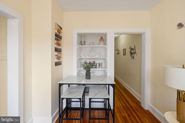 dining room featuring dark wood-type flooring